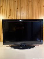 Front view of Toshiba 32-inch LCD TV on stand