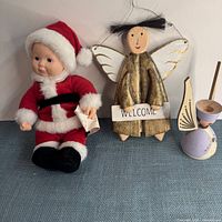 Anne Geddes baby Santa doll, wooden hanging angel with Welcome sign, wooden angel candle holder
