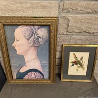 Both framed prints side by side