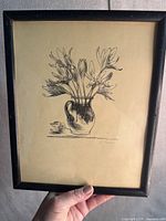 Full view of framed ink drawing showing bouquet in vase