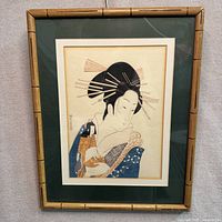 Full view of framed Utamaro woodblock print