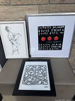 All three framed prints displayed together