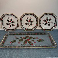 Group view of three snack plates and one platter showing pattern and shape