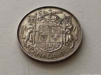 Reverse of 1952 Canada 50 cents coin