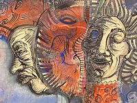 Close view of central portion showing stylized faces and textures