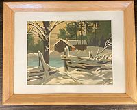 Full view of framed winter barn painting