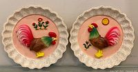 Front view showing both rooster plates