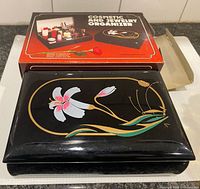 Organizer closed showing floral lid and box