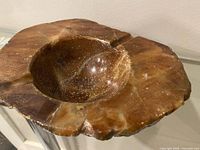 Top view showing entire alabaster ashtray with central bowl