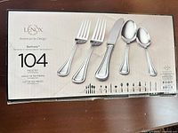 Front of Lenox Barlowe 104-piece flatware set box