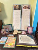 Front view of all 12 items laid out including large vertical frames and smaller pieces