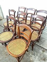 All eight ladder-back chairs grouped to show overall style and quantity