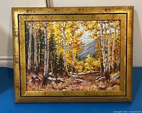 Full view of framed painting showing composition and frame