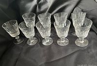 Front view of all nine crystal stemmed goblets