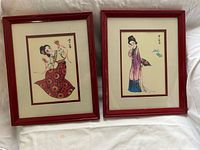 Front view of both framed illustrations