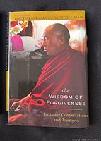 Front of dust-jacket showing title, authors, and image of Dalai Lama