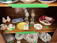 Full shelf view showing majority of lot items