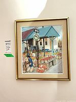 Full view of framed painting hanging on wall