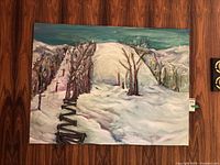 Full view of winter landscape painting on wood wall
