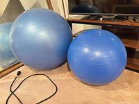 Both stability balls side by side for size comparison