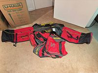 Both Salomon bags laid out showing color and logos