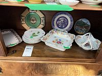 Shelf overview showing all china pieces arranged