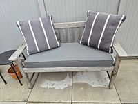Overall view of bench with cushions