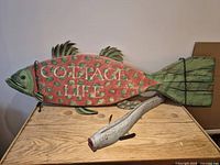 Both fish pieces on table