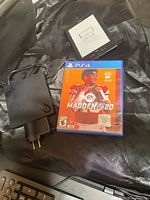 PS4 Madden NFL 20 game, Kobo e-reader, Android box power adapter