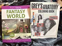 Front covers of both coloring books
