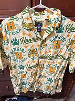 Front view of H&M Hawkins High camp collar shirt on hanger