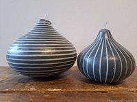 Front view of both striped candles