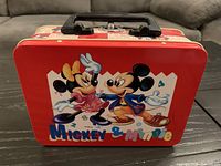 Front view showing Mickey & Minnie graphics and overall exterior condition