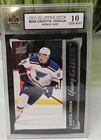 Front view of encapsulated 2021-22 Upper Deck Young Guns #204 Dakota Joshua rookie card showing KSA grade 10 Gem Mint label