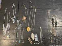 All jewellery pieces laid out showing necklaces, bracelets, earrings