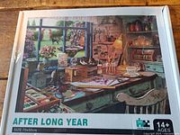 Front of sealed puzzle box showing artwork, title, piece count, size, and age rating