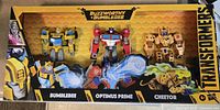 Front view of sealed Buzzworthy Bumblebee box showing Bumblebee, Optimus Prime and Cheetor figures