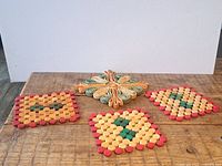 All four trivets arranged on tabletop