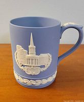 Front view showing All Souls Church relief and handle