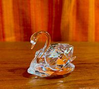 Side view of the clear faceted crystal swan figurine