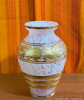 Full view of vase front showing decoration