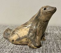 Left front view of soapstone seal figurine