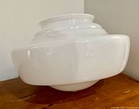 Side profile of white milk glass schoolhouse shade