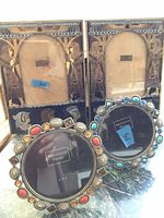 Group shot of two Egyptian etched frames and two jeweled Sheffield Home frames