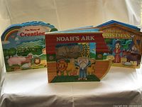 Front covers of the three board books