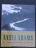 Front cover of portfolio showing Ansel Adams title text and sample image