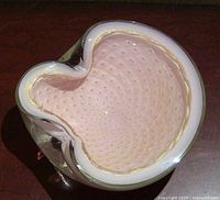 Top view showing pink bullicante interior with controlled bubbles