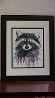 Framed raccoon watercolour painting full view