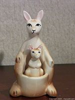 Front view of ceramic mother kangaroo with joey in pouch