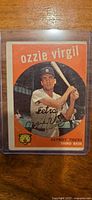 Front of 1959 Topps Ozzie Virgil card in top loader